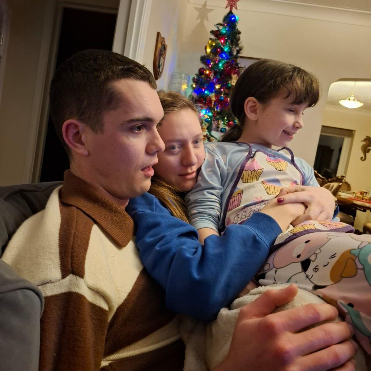 Got flattened at our first Overseas Christmas. (Only joking, we love all the cuddles).