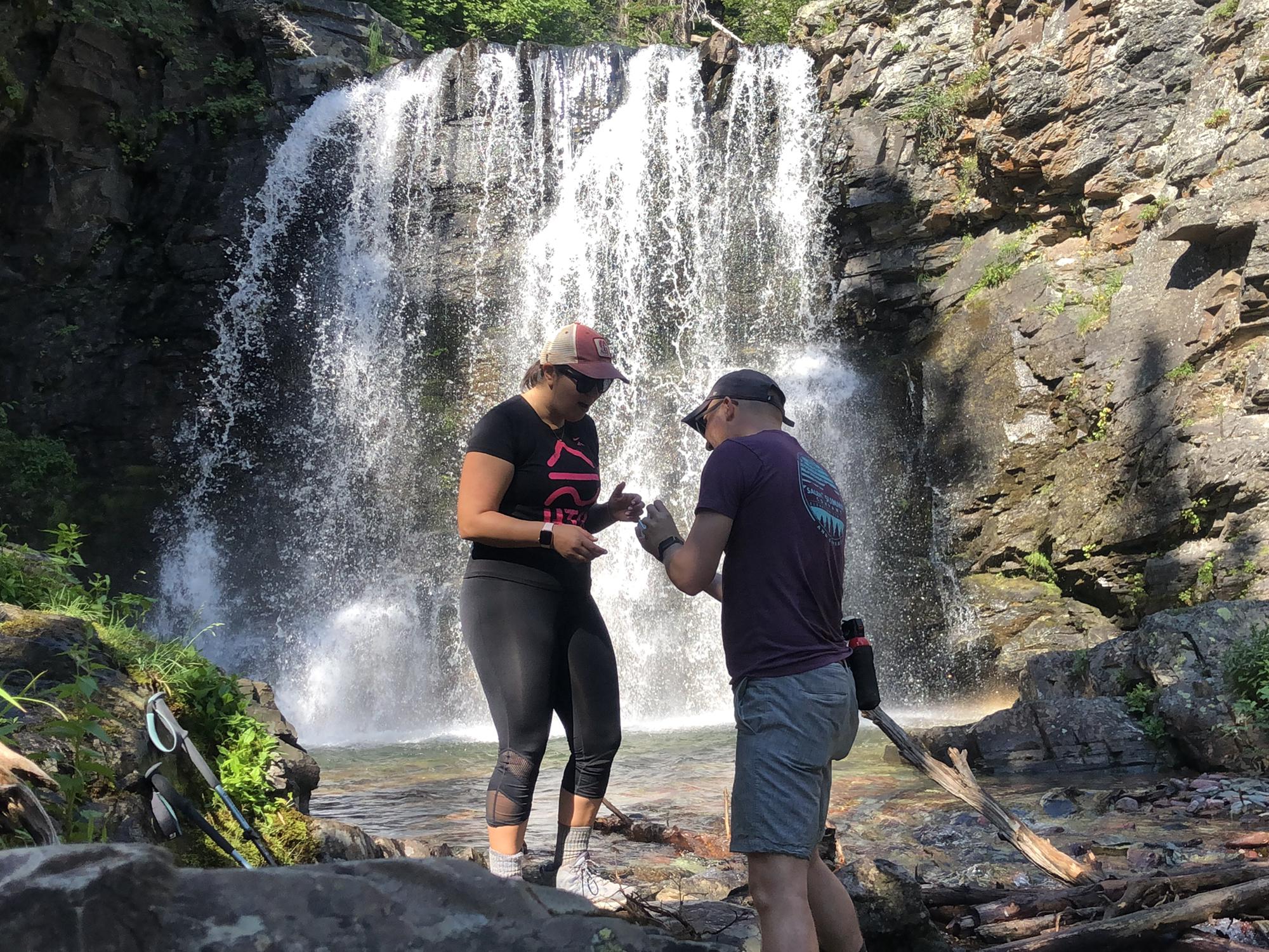 Our engagement in front of Rockwell Falls at Two Medicine in Glacier National Park.