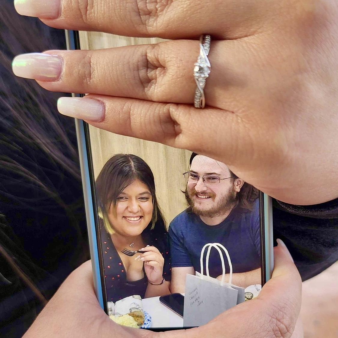Showing off the ring and a good memory