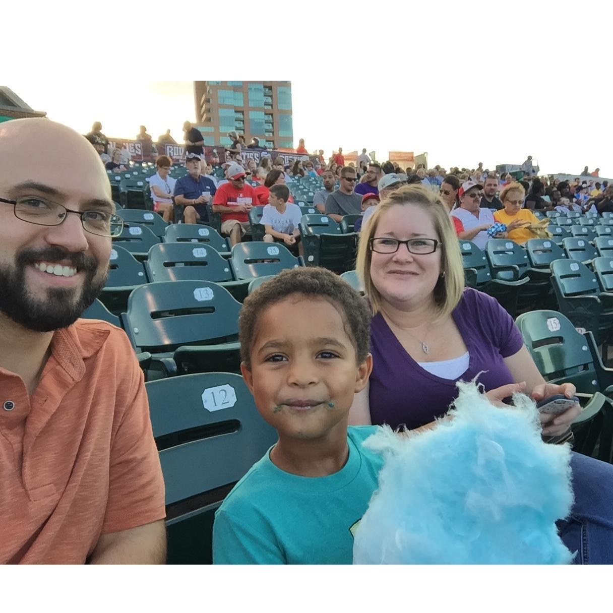 Family night at a Louisville Bats game - can't leave without some cotton candy.