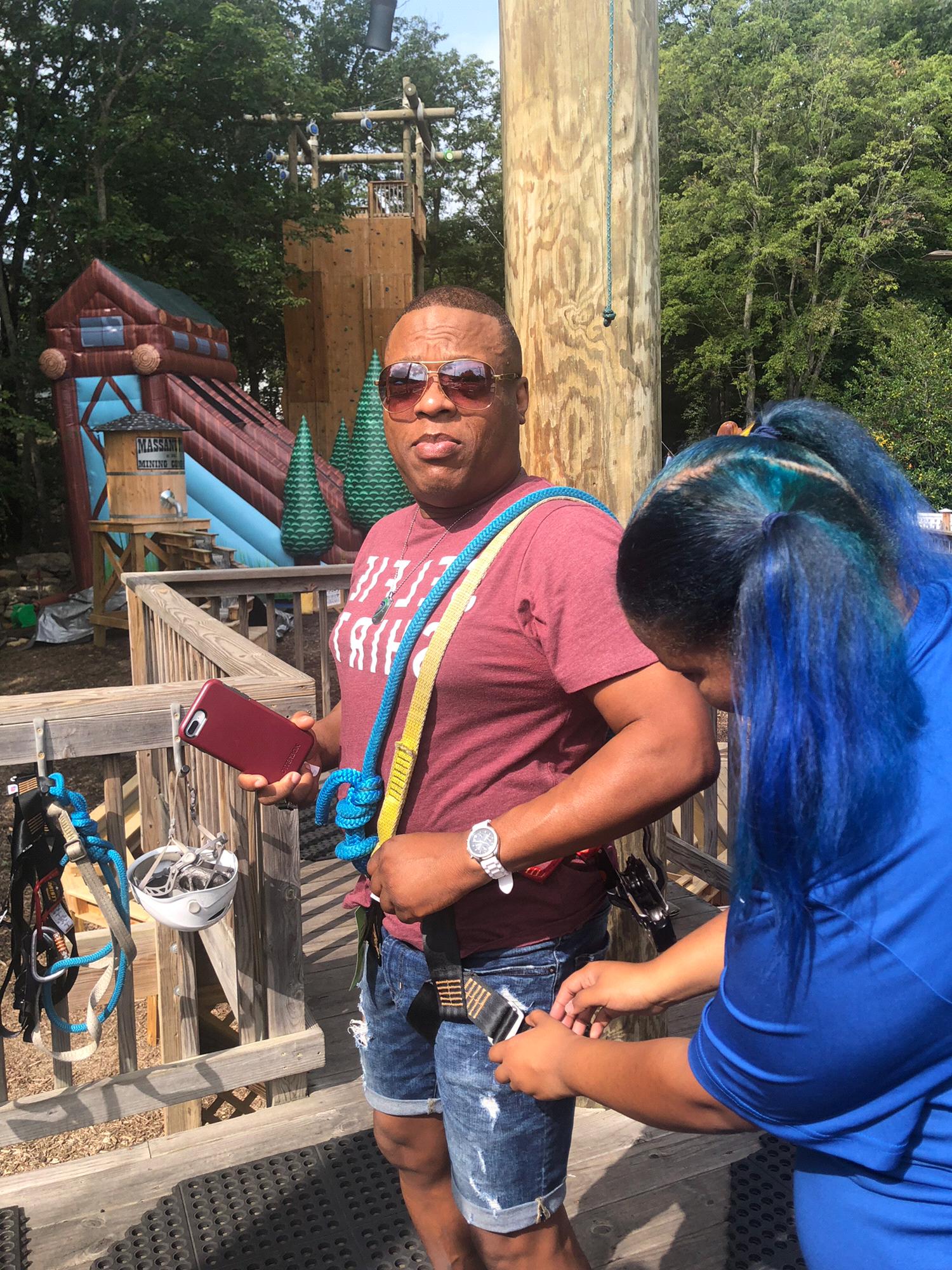 "Do I REALLY want to do this??!" getting strapped in for Ziplining.