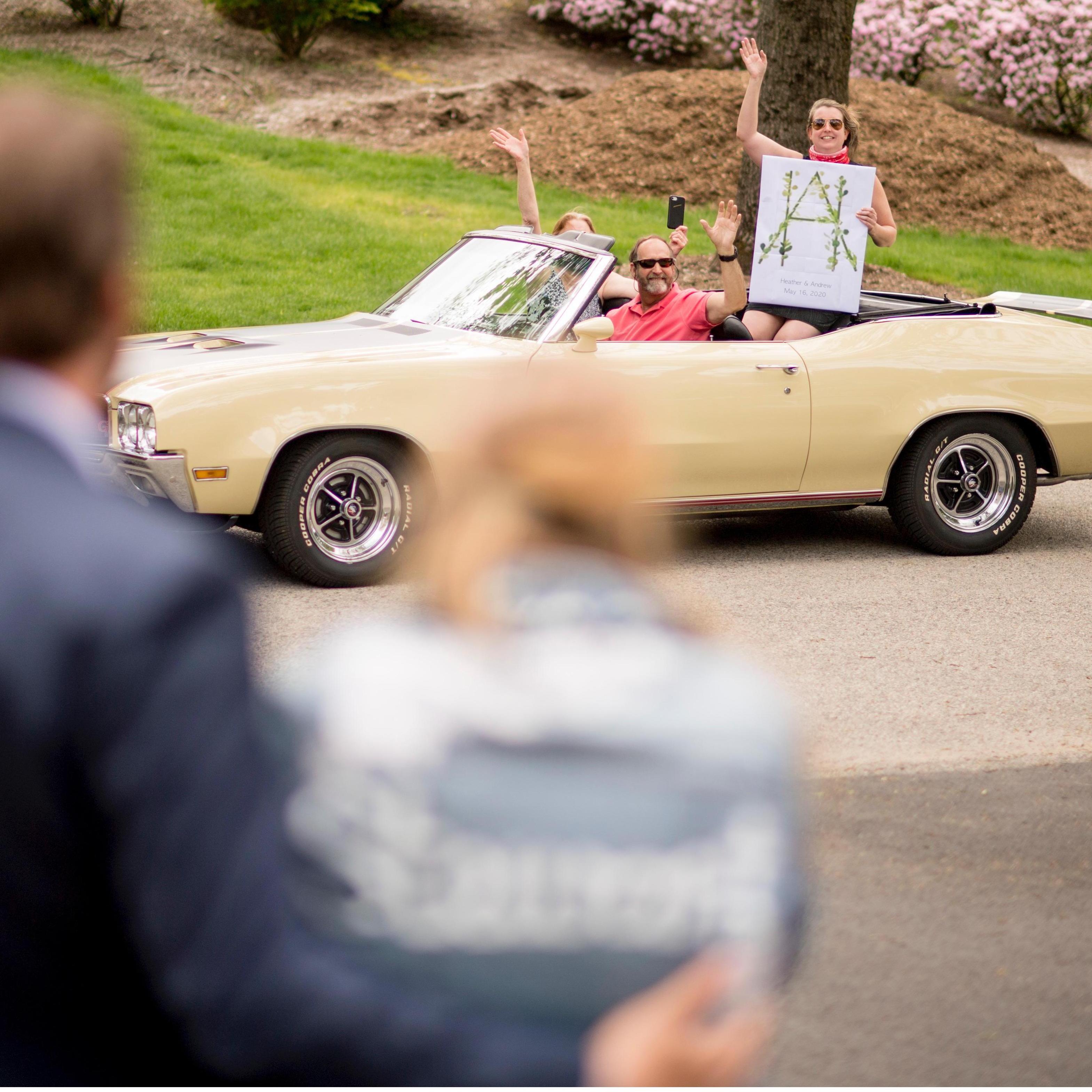 Jess + fam in the car parade! - Scott Zuehlke Photography