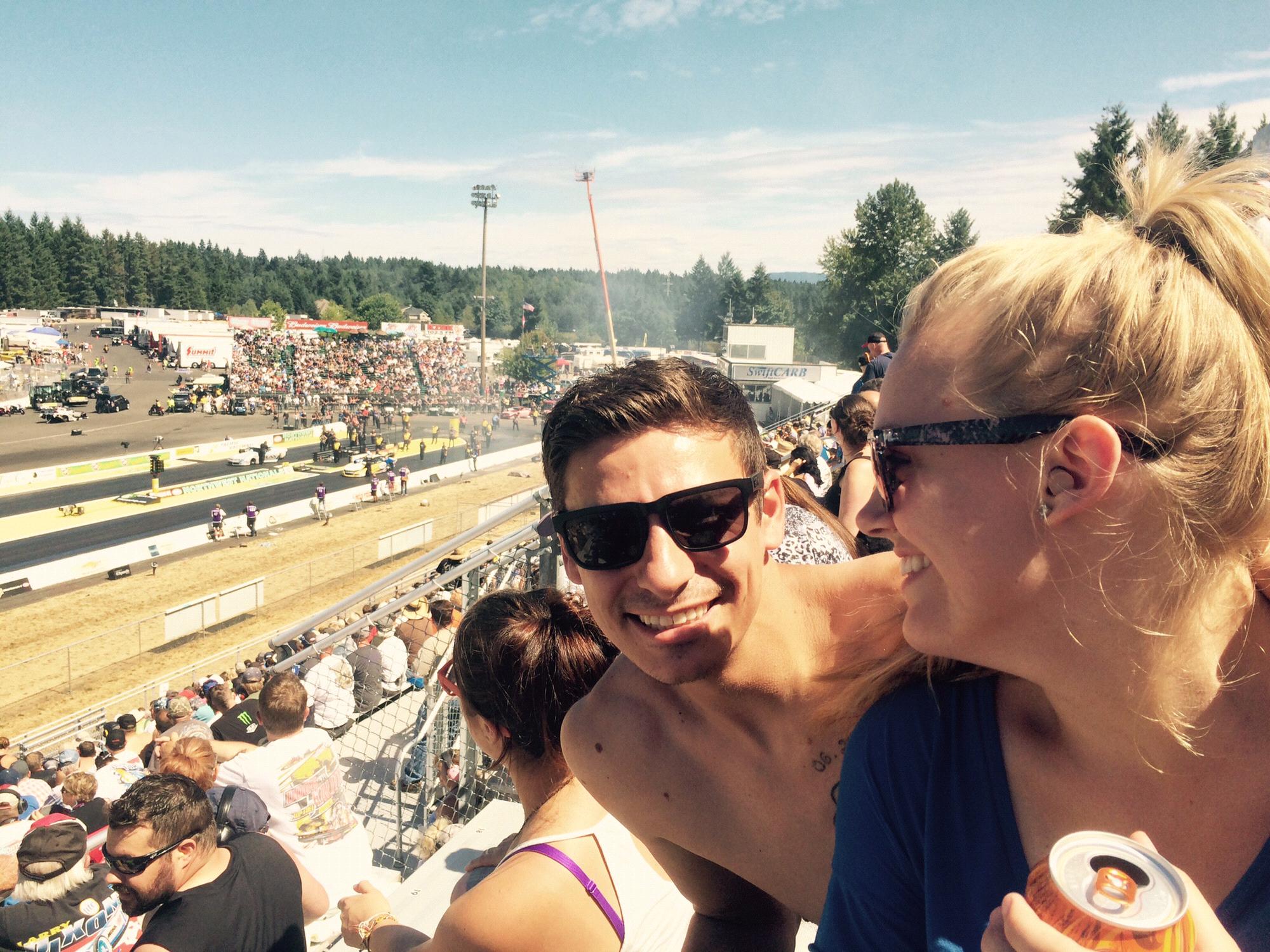 Jeremy used to have magnificent hair, and apparently no shirt. Drag races drinking overpriced garbage beer in the heat!