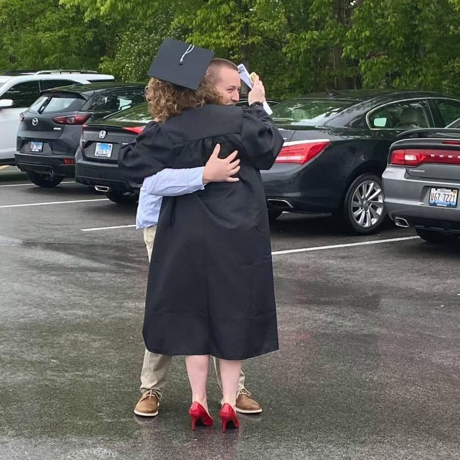 Hiding behind me so my mom couldn't get a good picture! I had no idea a picture was being taken, so you could imagine how odd I thought he was acting! Still one of my favorite pictures and memories!