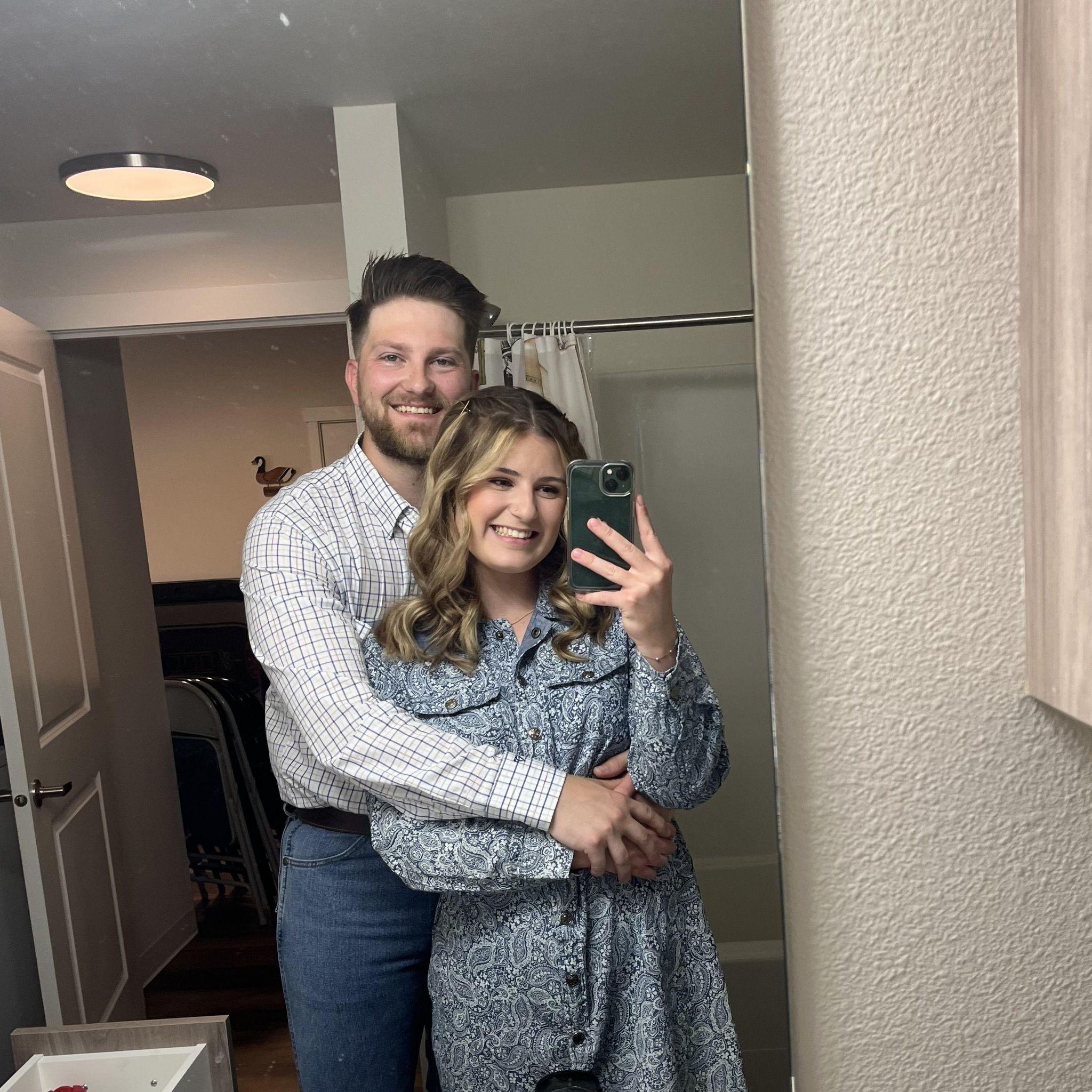 Getting ready for our "anniversary photo-shoot." Emily had no idea she was getting ready for their engagement!