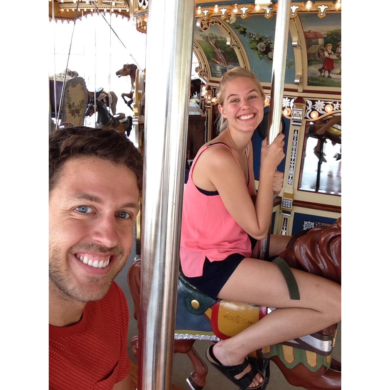 Riding the merry-go-round in Dumbo, Summer 2015