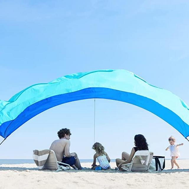 Shibumi Shade® - World's Best Beach Shade. Designed and Sewn in America. The Original Wind Powered Beach Shade.