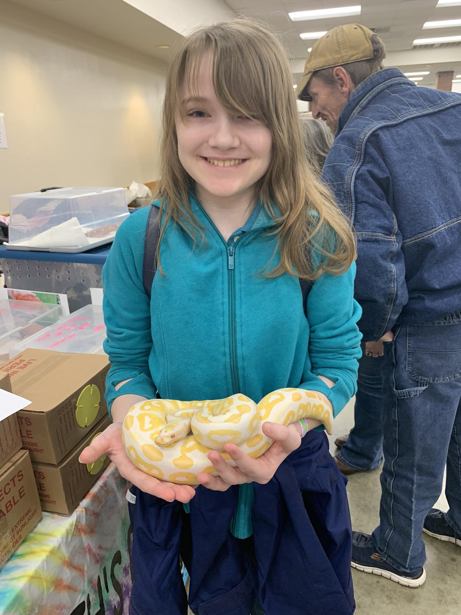 Cadence really surprised us at an expo when she wanted to hold a ball python! So proud of her!!