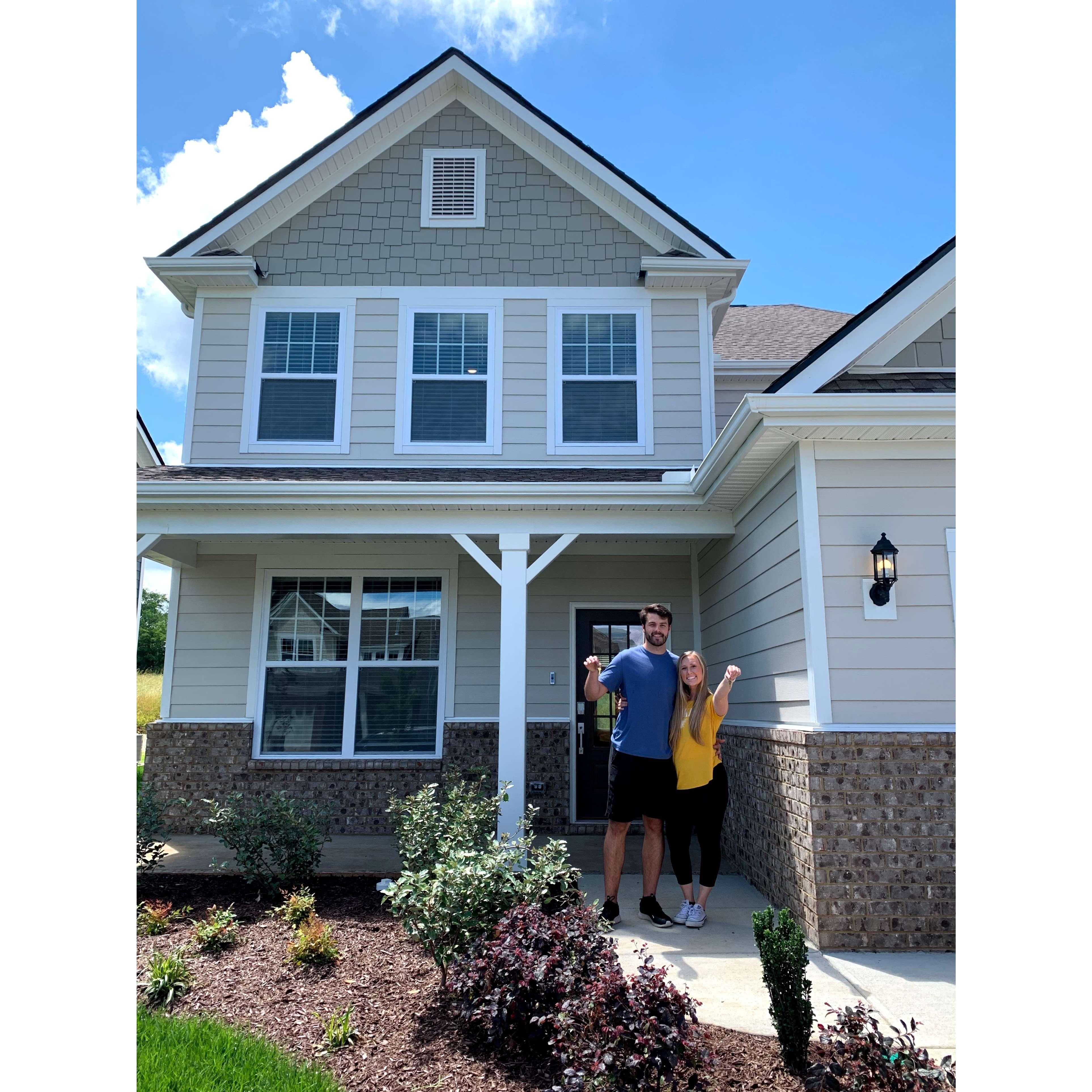 The day the couple bought their home!