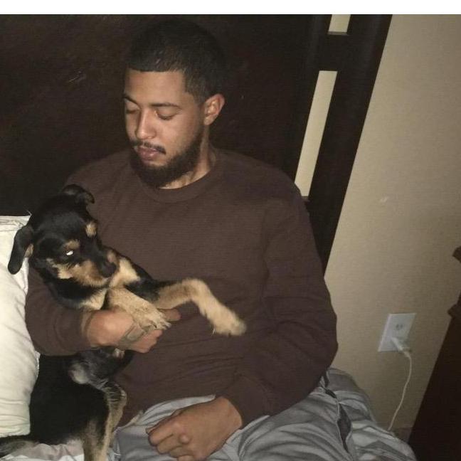 Brandon with our Little Dog boy (Rico)💚 🐶
