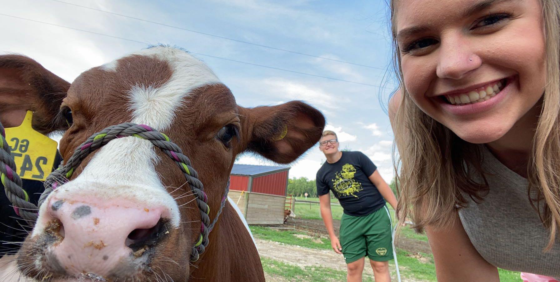 Here is Josh and I doing one of the summer chores of washing the cows! This was one of my favorites named Cooper! June 29, 2020
