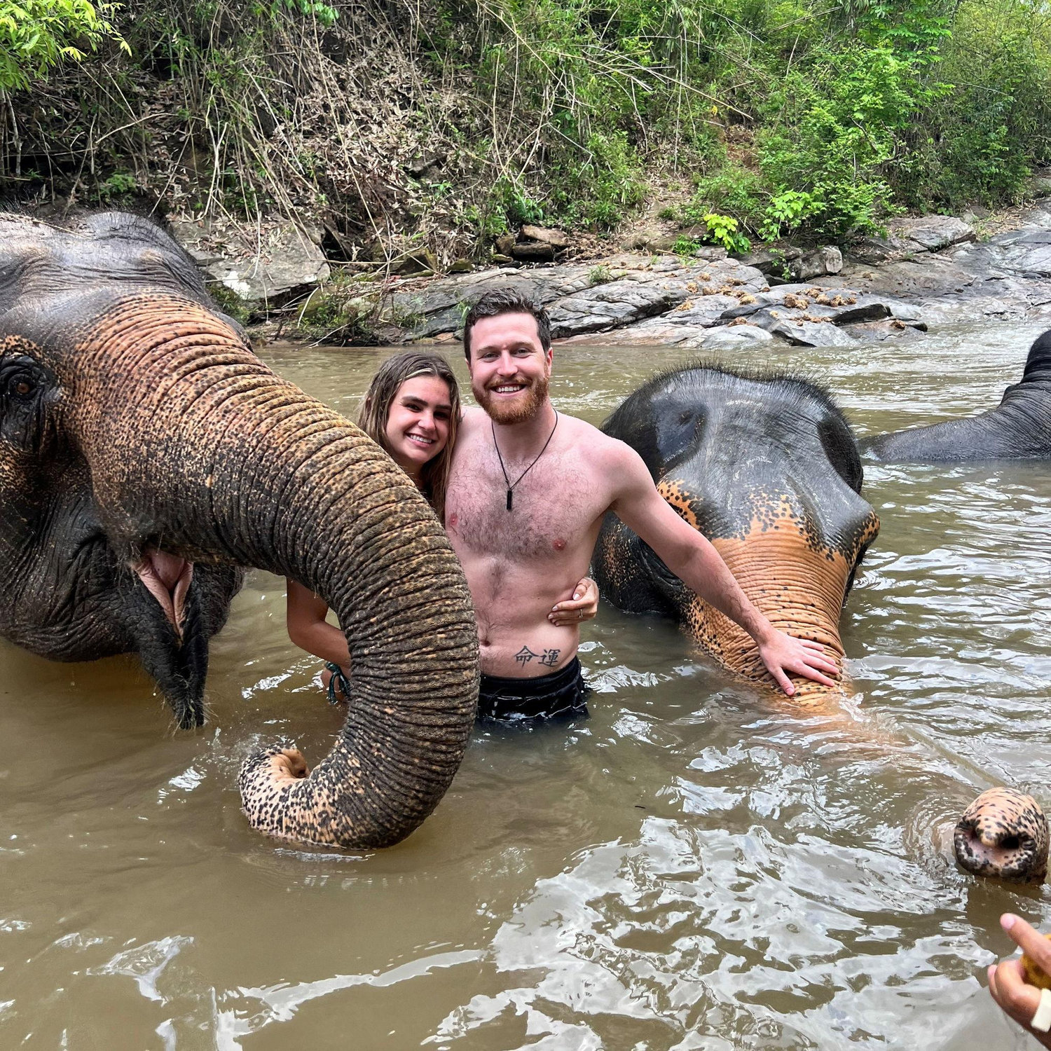 May 2023 :) Our first trip to Asia together!! Swam with dolphins and prayed our toes didn't get stepped on.
