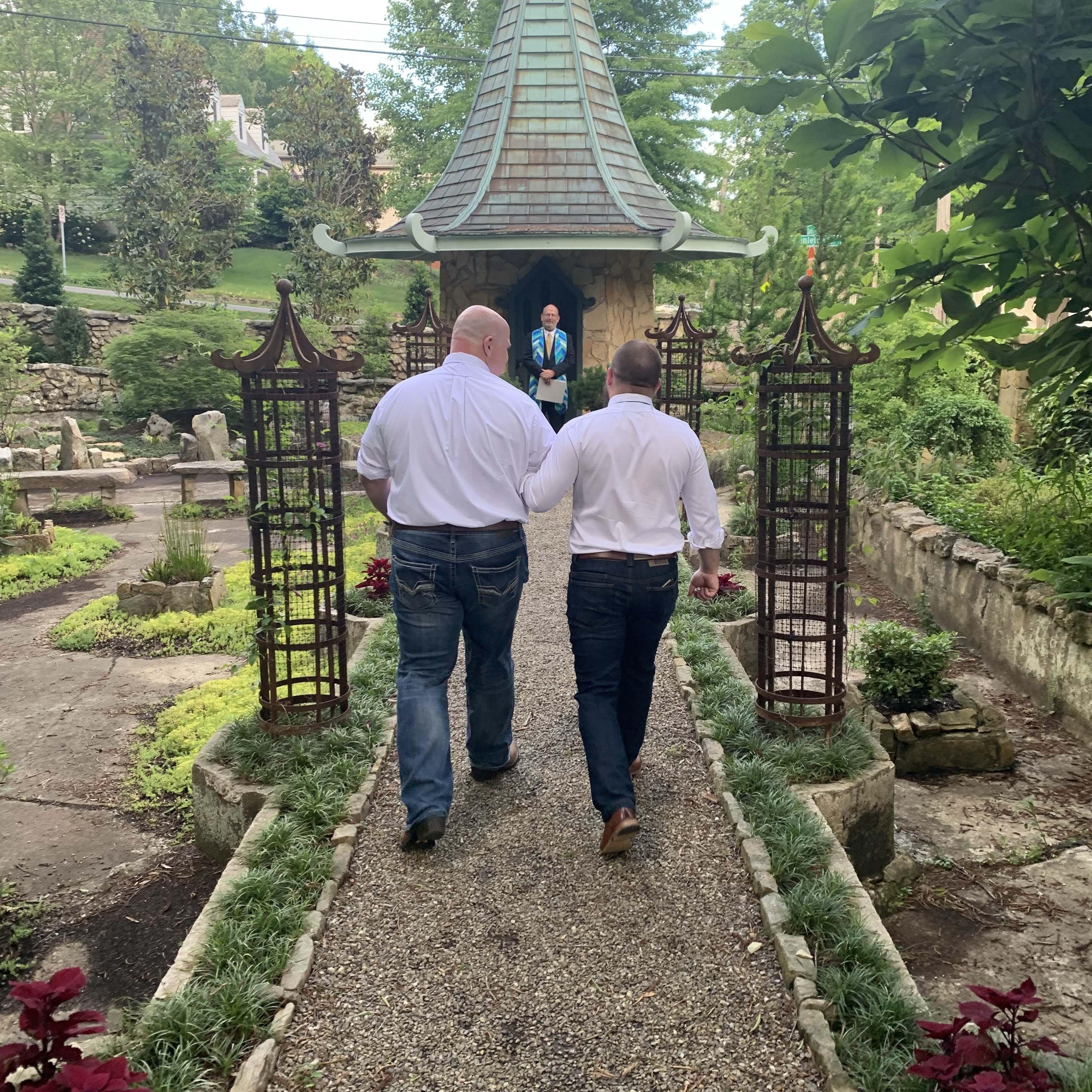 Jake escorting Tim down the aisle