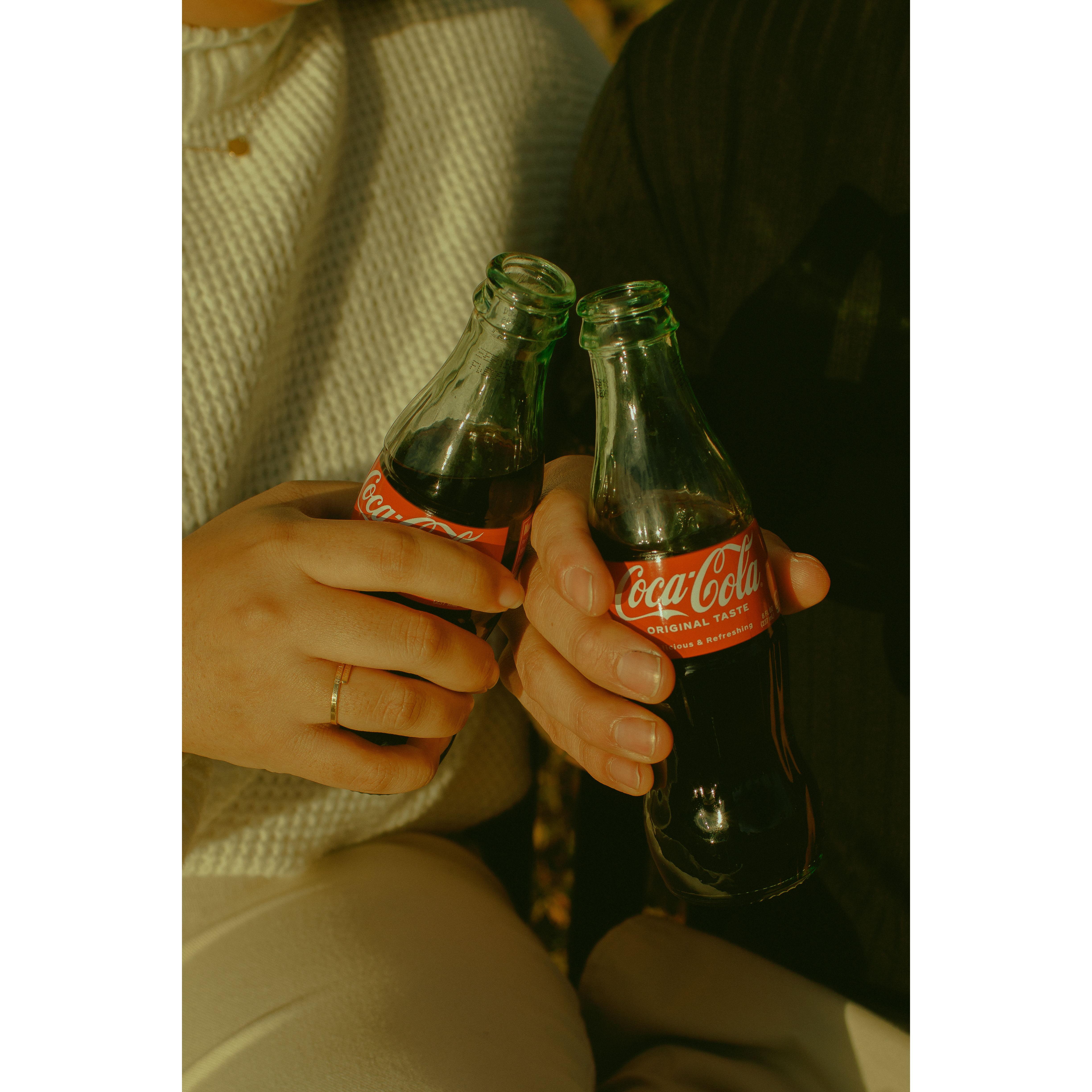 Before we were of legal drinking age we would "Crack open cold ones" with a coca cola. Over the years its meaning has evolved to imply we are having a good time together.