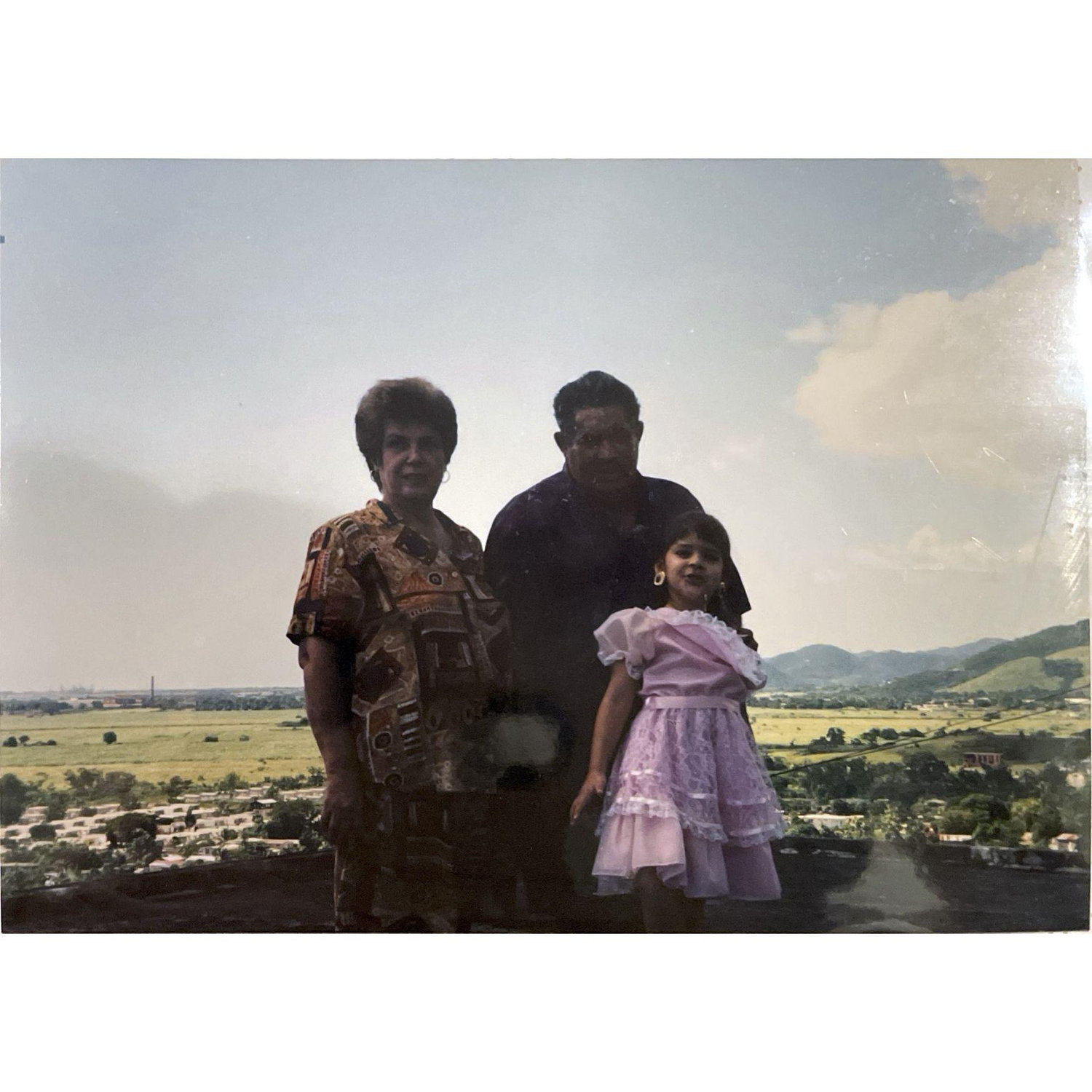 Jessica, just before her 5th birthday, with her grandparents.