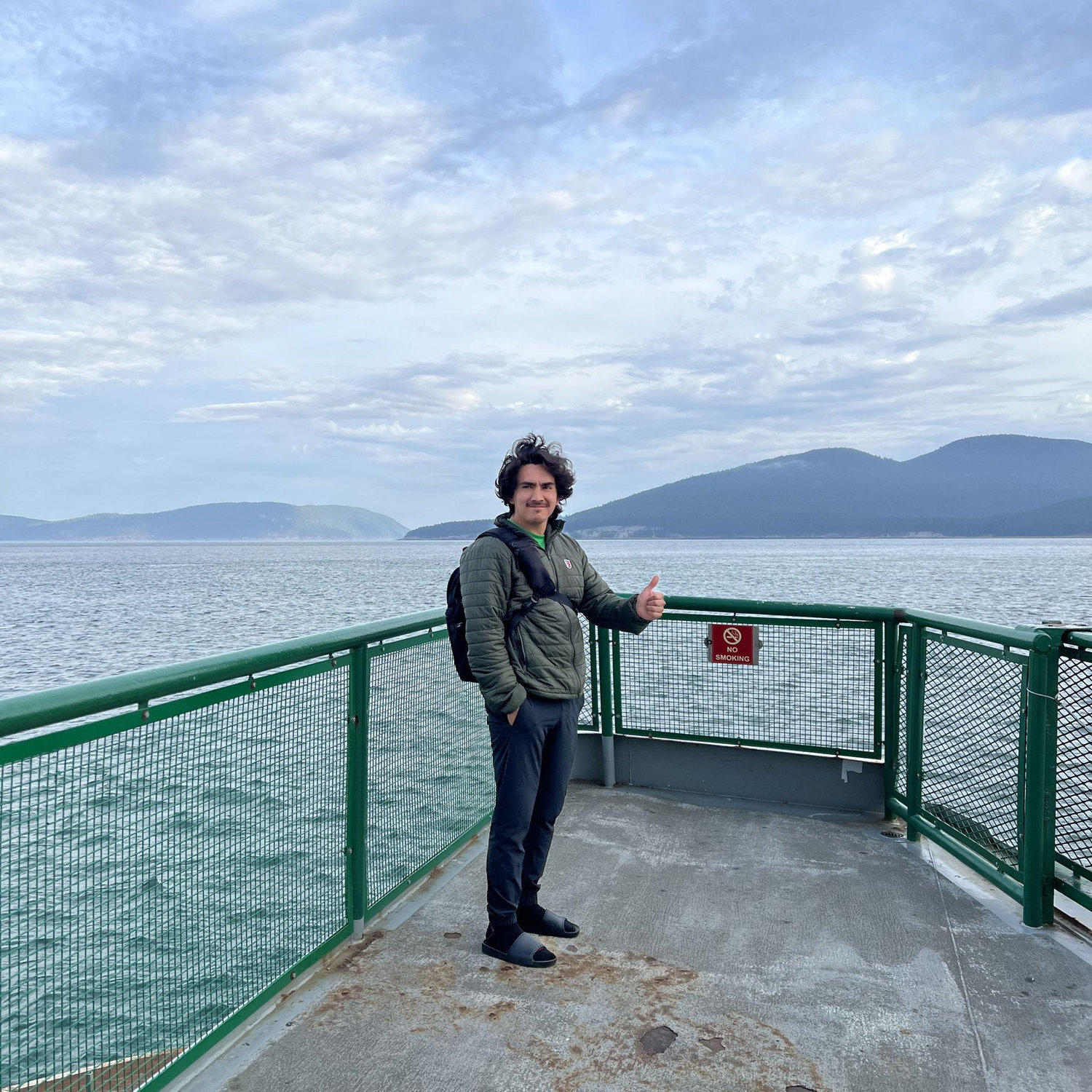 Jesus enjoys the ferry to Orcas Island, giving his classic thumbs up.