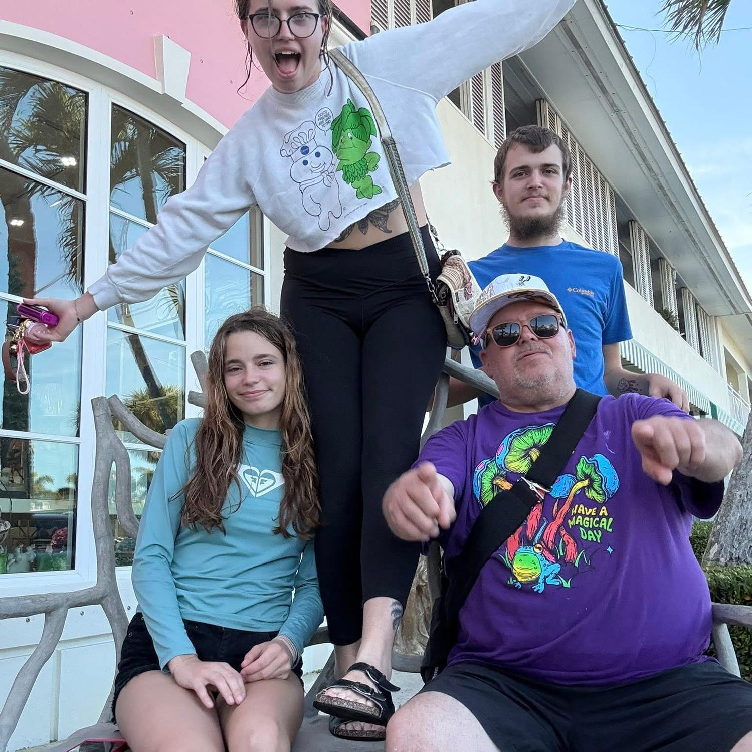 Ciearra pictured with her father, Will; her sister, Jazmine; and her brother, Justin.