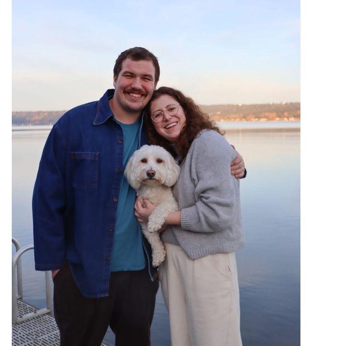 This can't be our wedding website without excessive photos of us with our dog!