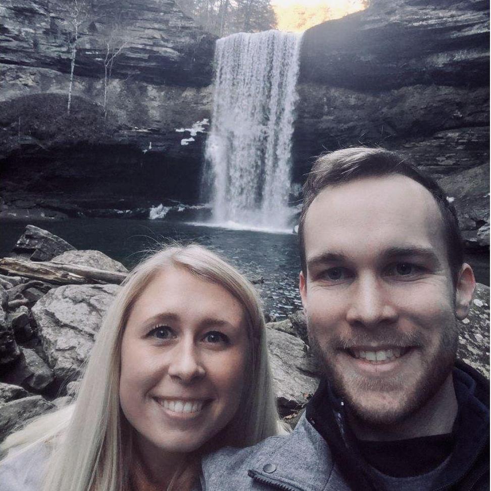 cheesin after he got down on one knee!