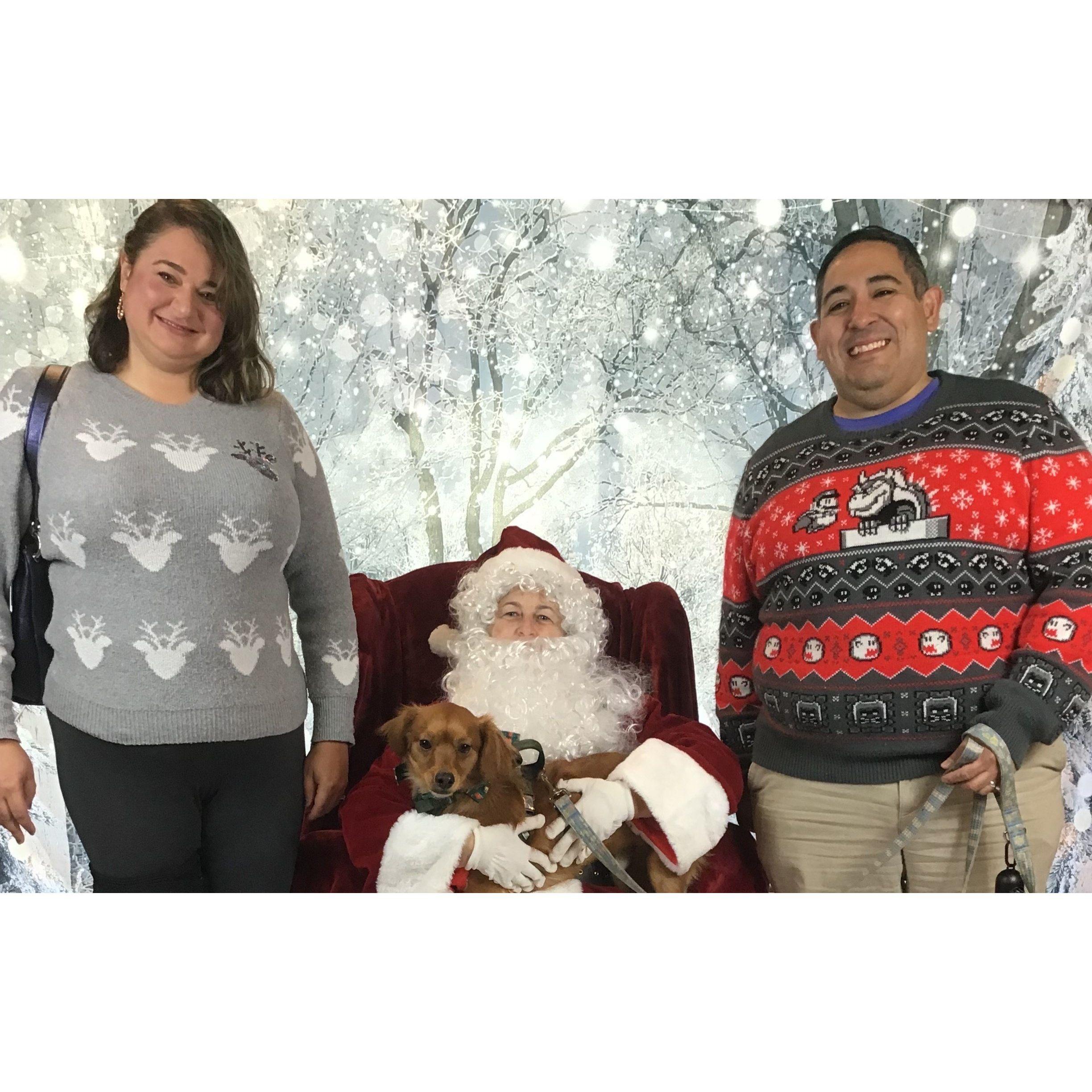 Our dog Wally meets Santa.