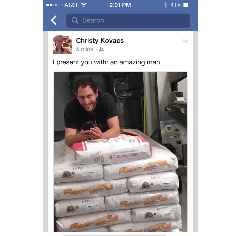 A bagel man, his sacks of flour, and his proud girlfriend.