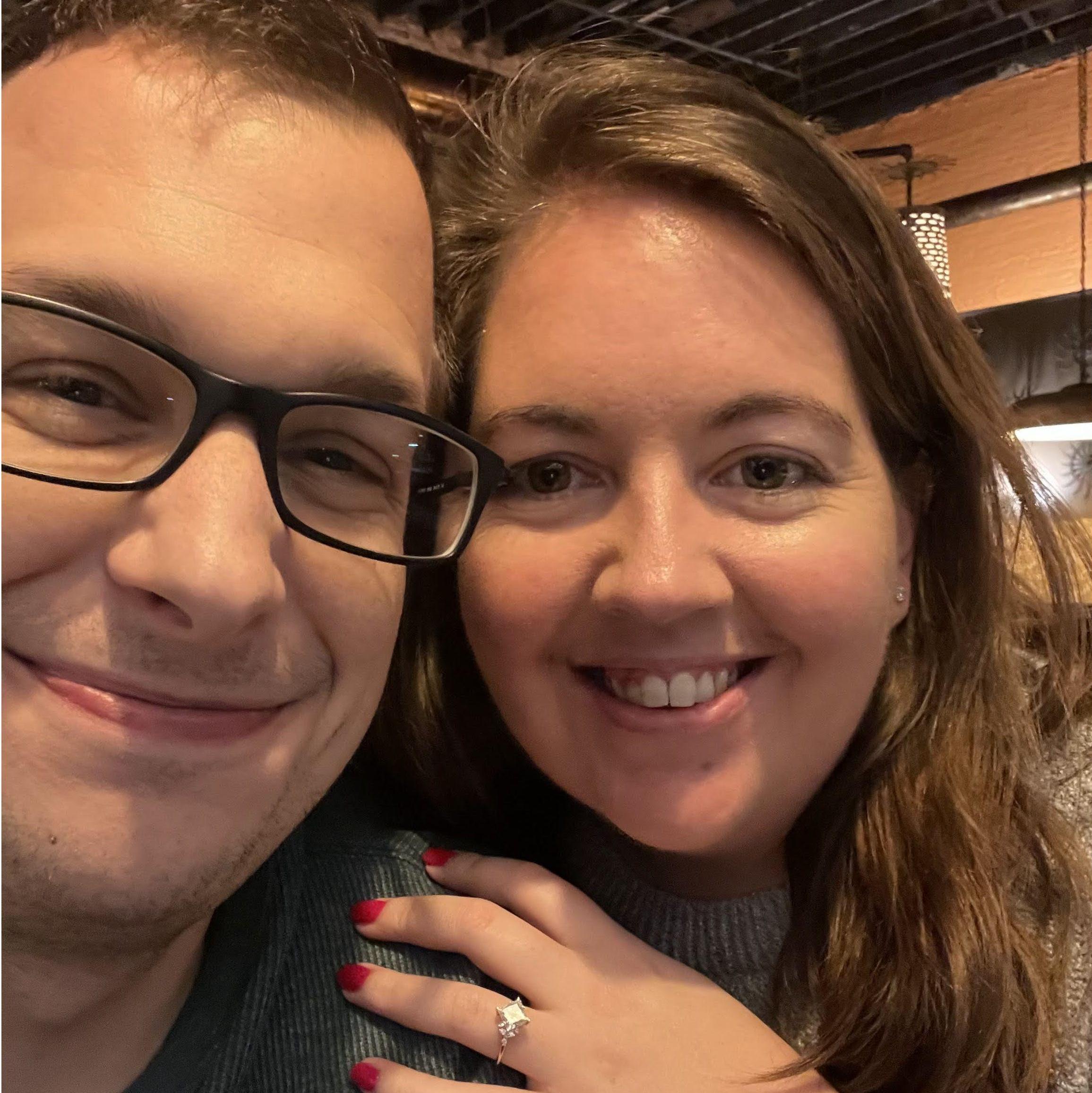 Engaged and beaming.