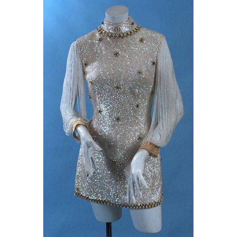 Glitter, rhinestones, and fringe is definitely on theme!
