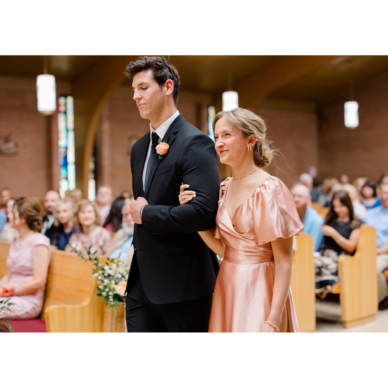 We were both in Michael and Olivia Price's wedding party and got to walk down the aisle together!