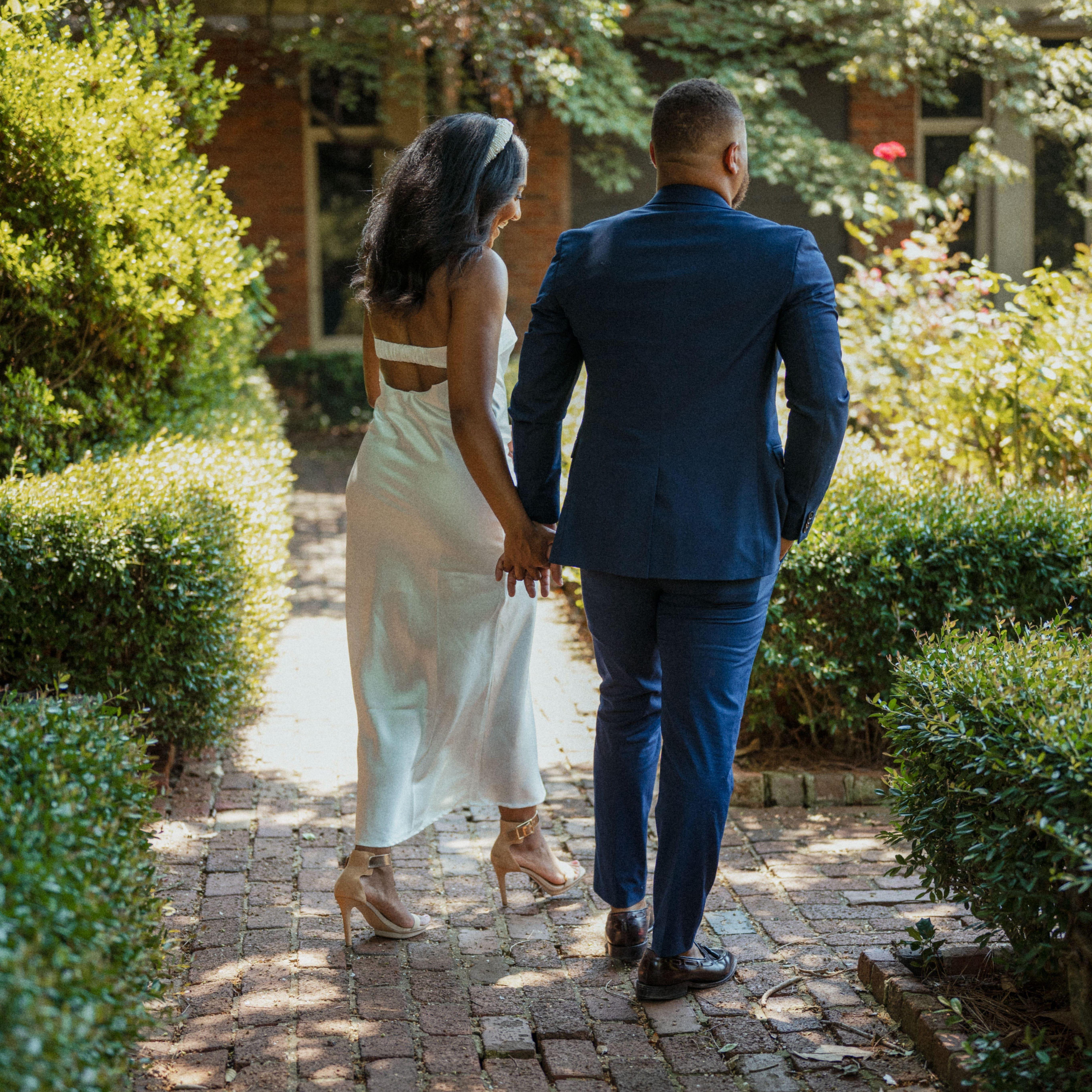 Walking through the beautiful rose garden right after Alex proposed!