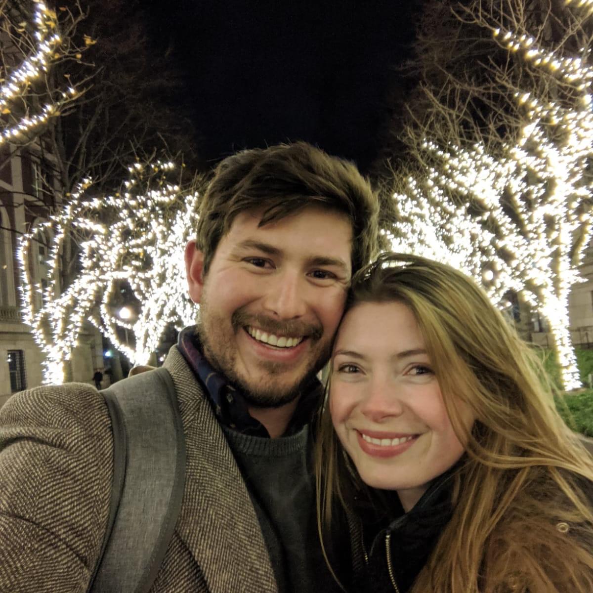 2019: Daveed’s first visit to Sarah in NYC to explore the city with her for his birthday. Here in front of the Columbia campus trees lit for the holidays.