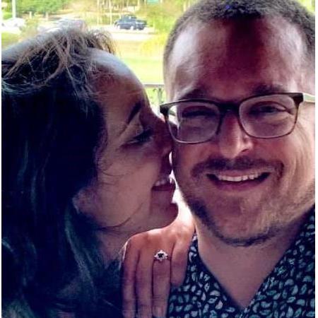 This was taken the day we got engaged. We both love my non-traditional ring.