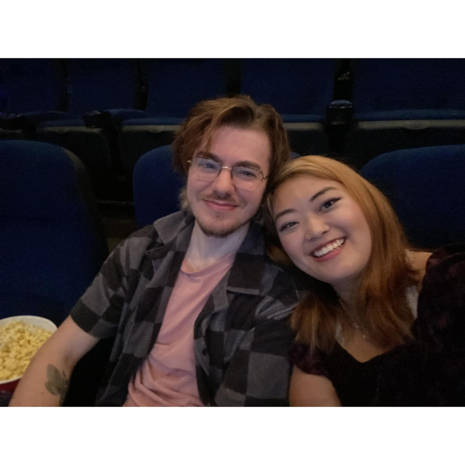 Even though we both worked at a movie theater for years, we love going to the movie theater to watch a movie.