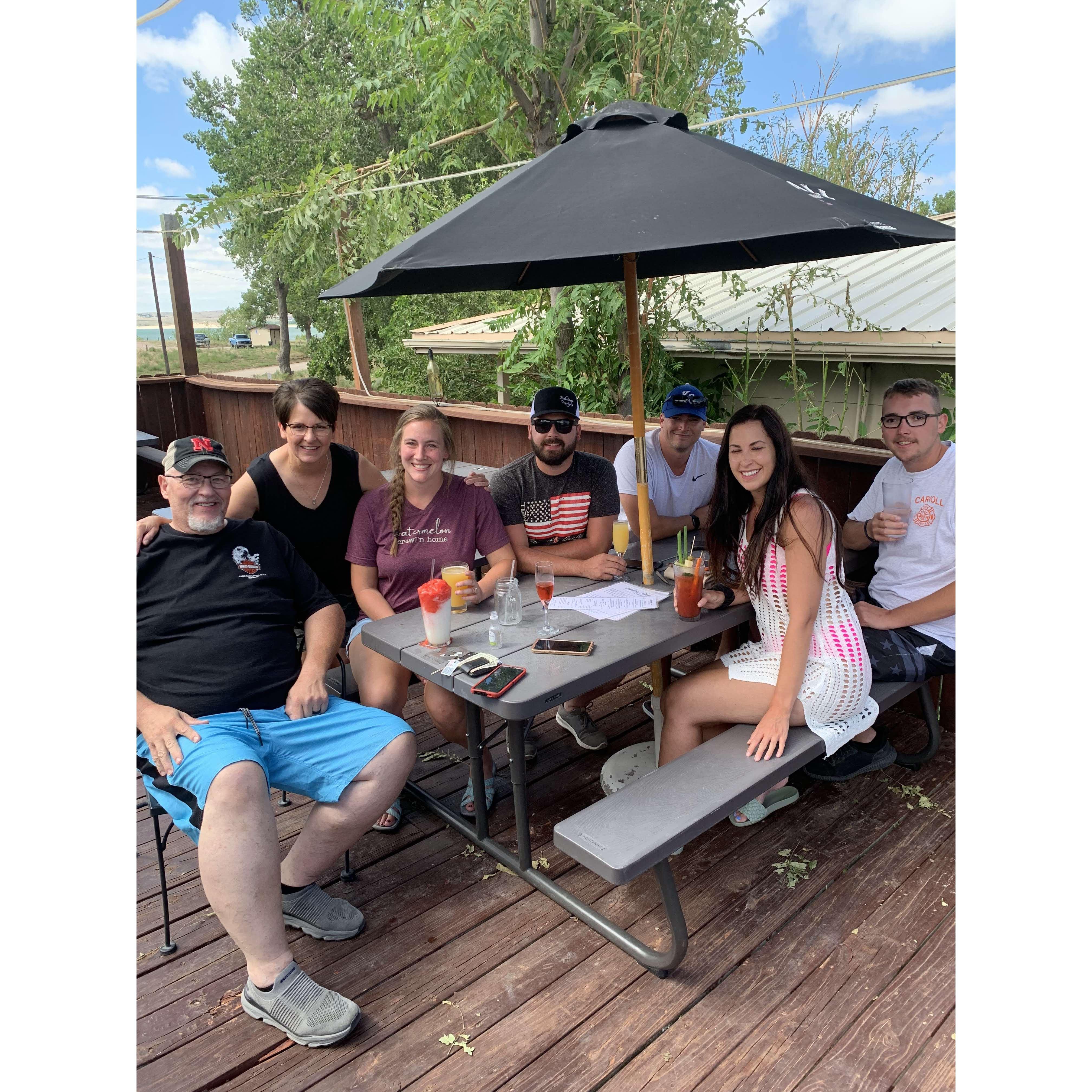 Derek's family: Dad Jeff, Mother Conni, the happy couple, Sam (boyfriend of Karissa), Sister Karissa, and brother Cameron