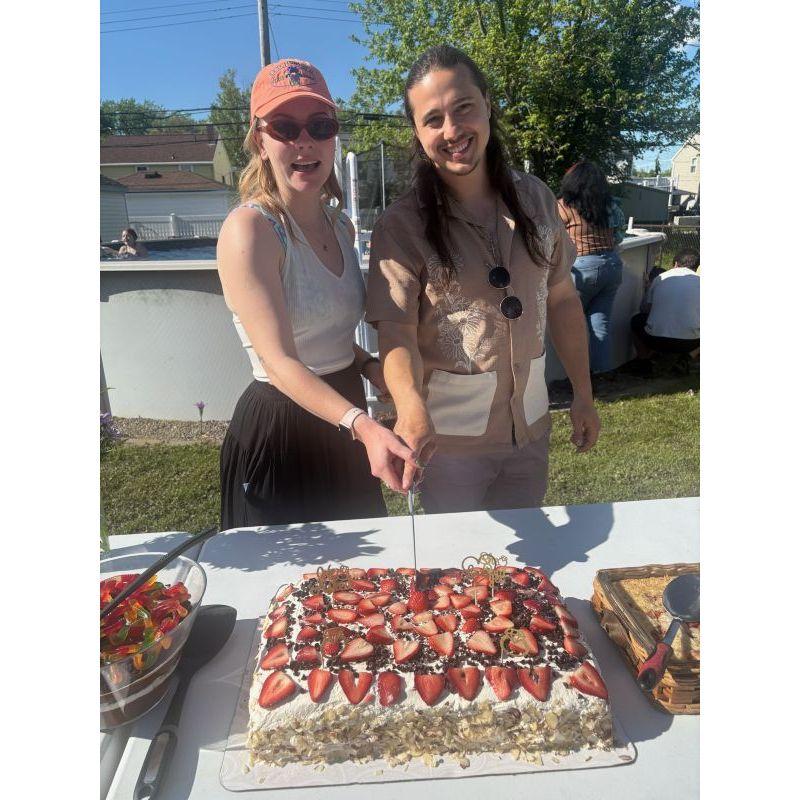 At a surprise engagement party the next day! Thank you for the cake Paula!