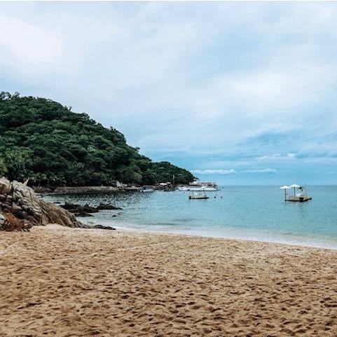 Wedding ceremony and reception at Las Caletas Private Beach. That boat in the back? yes, that's where you dock. Reference the next photo and caption when planning your complete look for the day.
