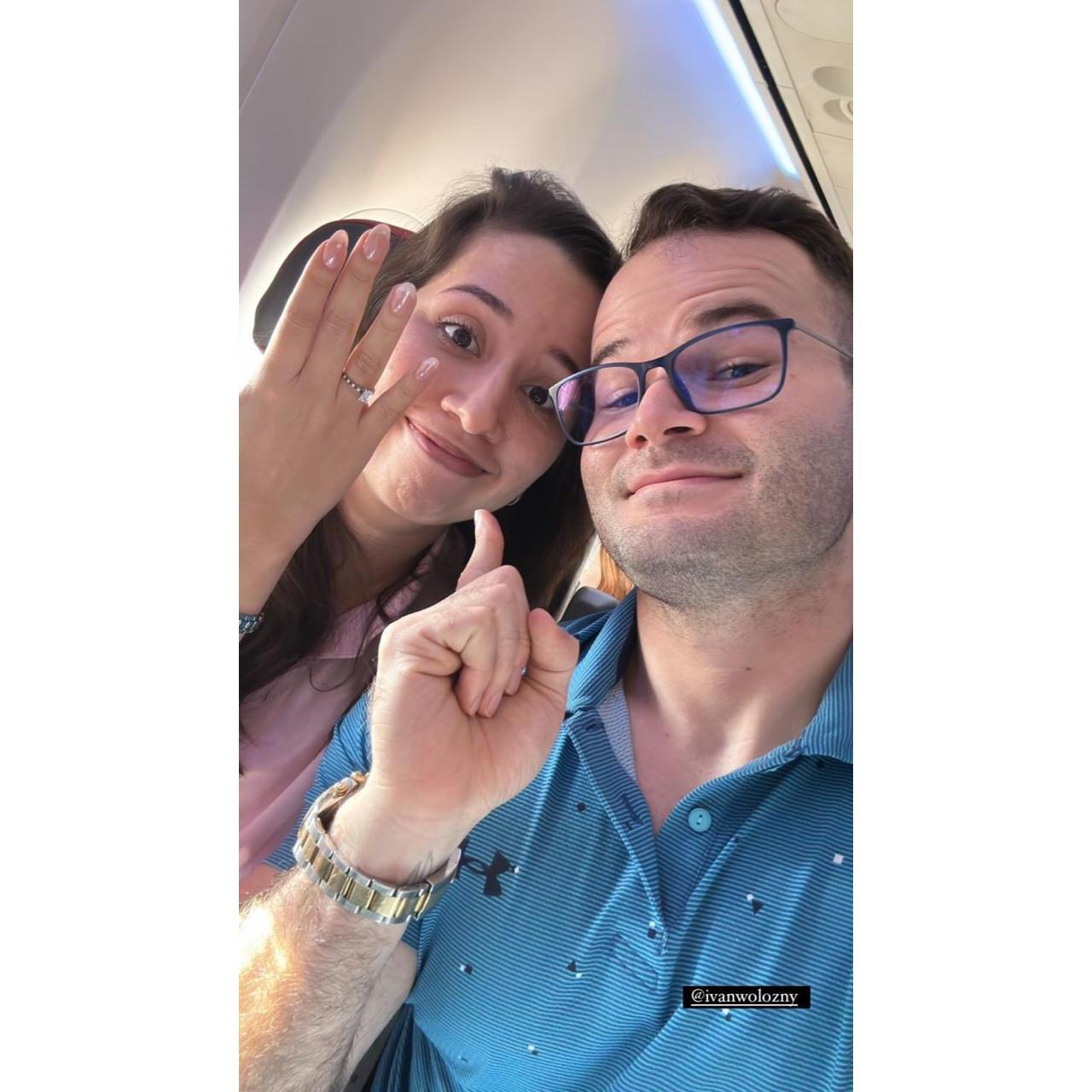 The Mr. and Mrs.! On a plane right after the ring!