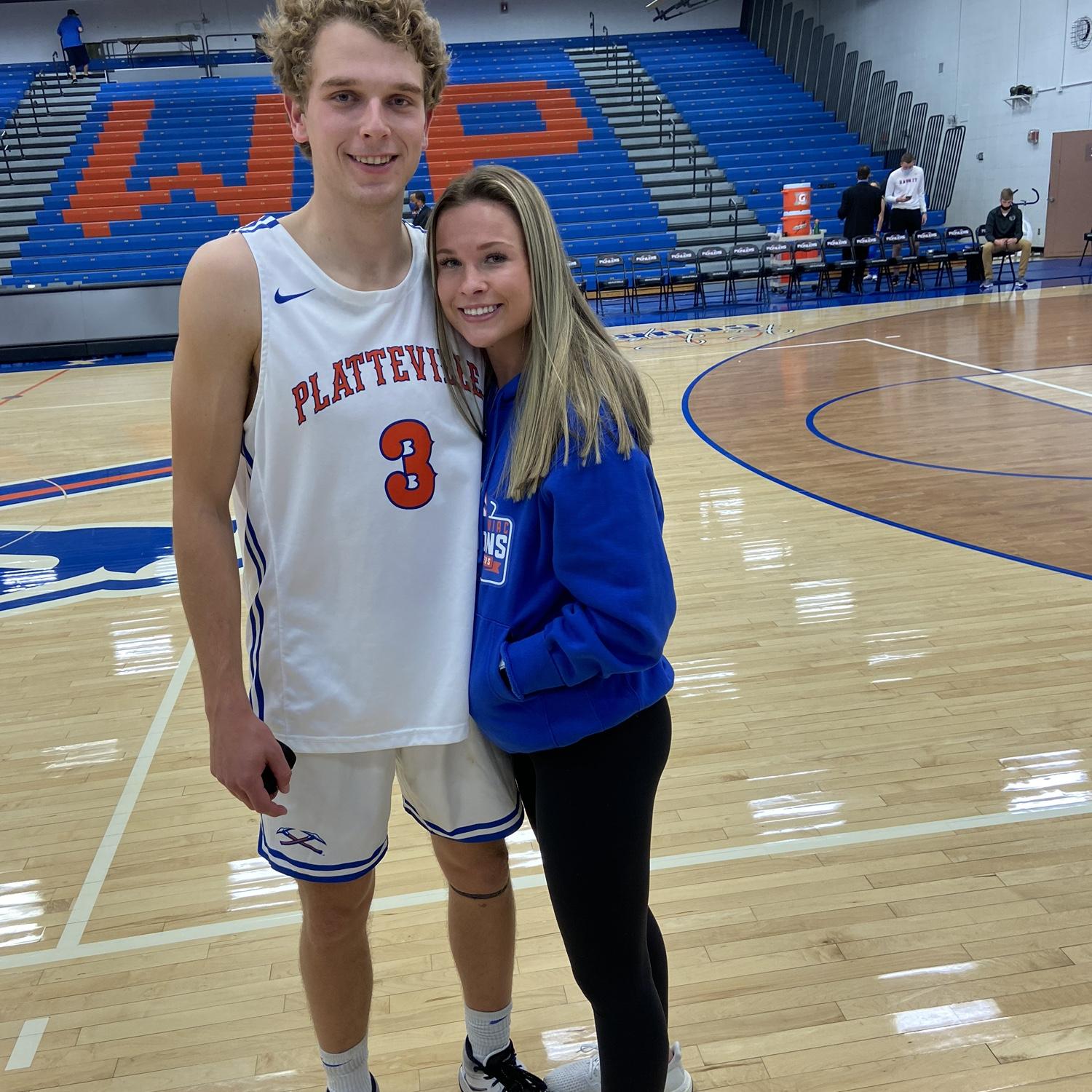 Cheering on Blake at his UWP basketball games! Zoey tried her best to be at every game despite being in nursing school herself.