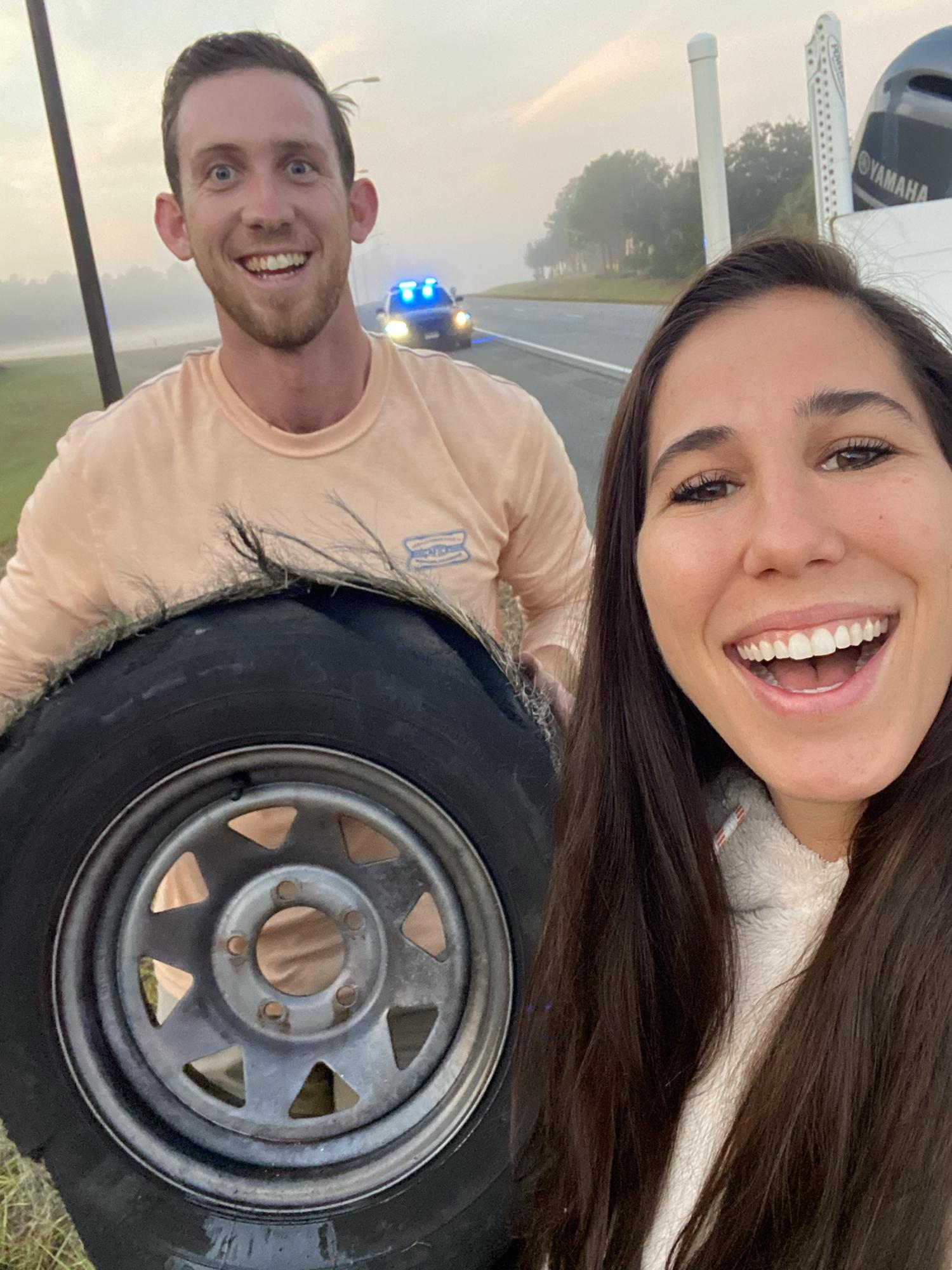 The moment I knew I could marry Matt. Watching him fix a tire at 5 am all the while being joyful!