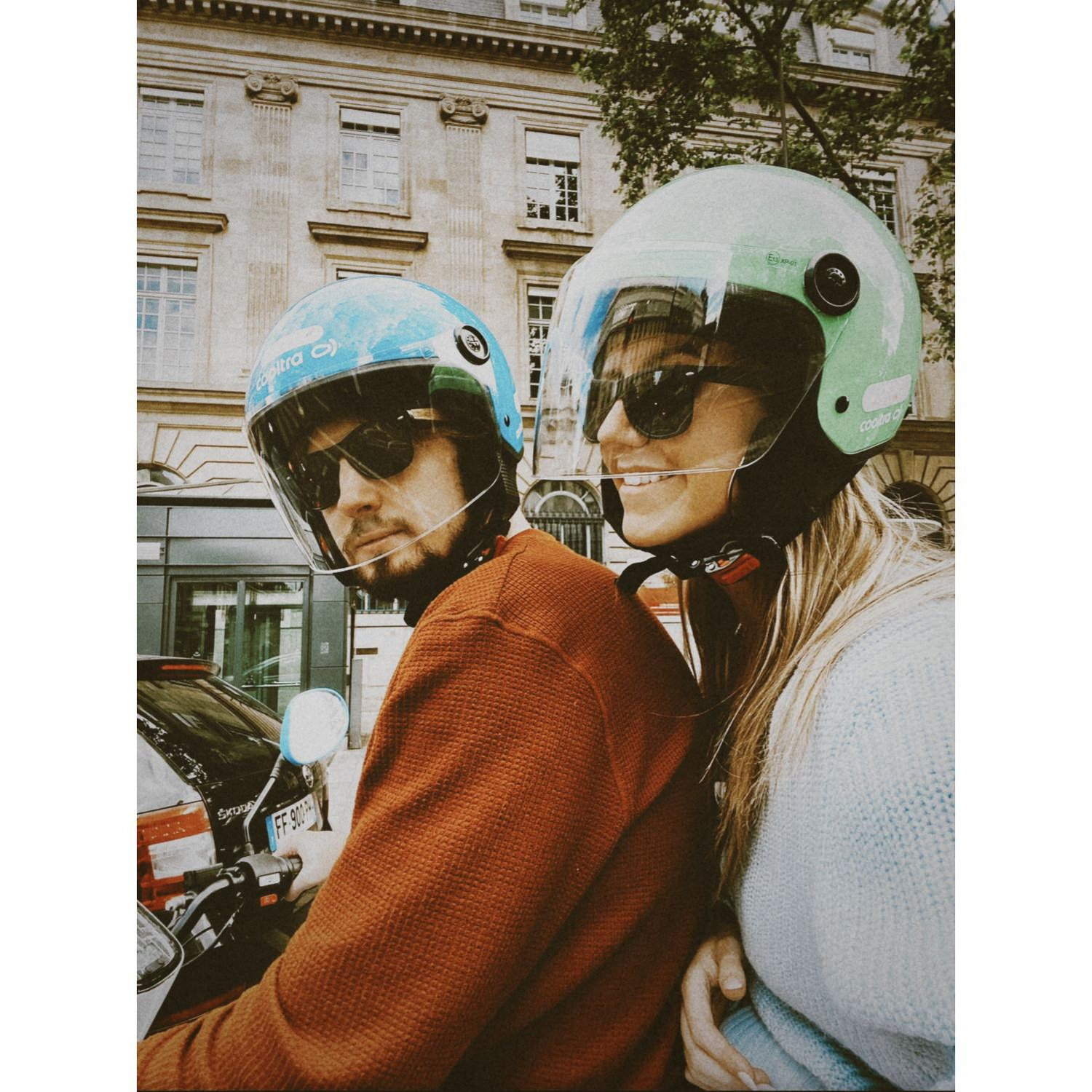 James driving and Kate mapping through rush hour in Paris.