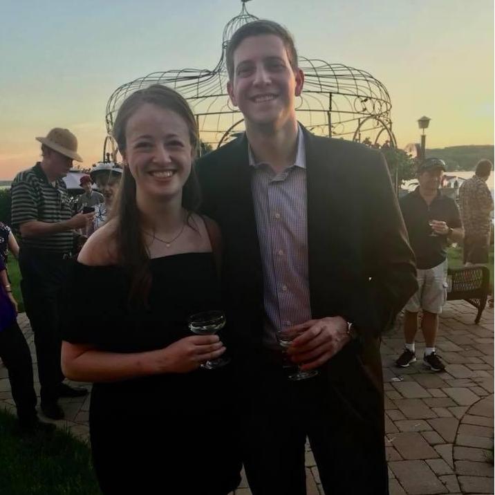 May 2018 - Our last photo as boyfriend and girlfriend. Despite being asked if anyone in the crowd wanted to propose, Dan played it cool with the ring in his pocket until later that evening.
