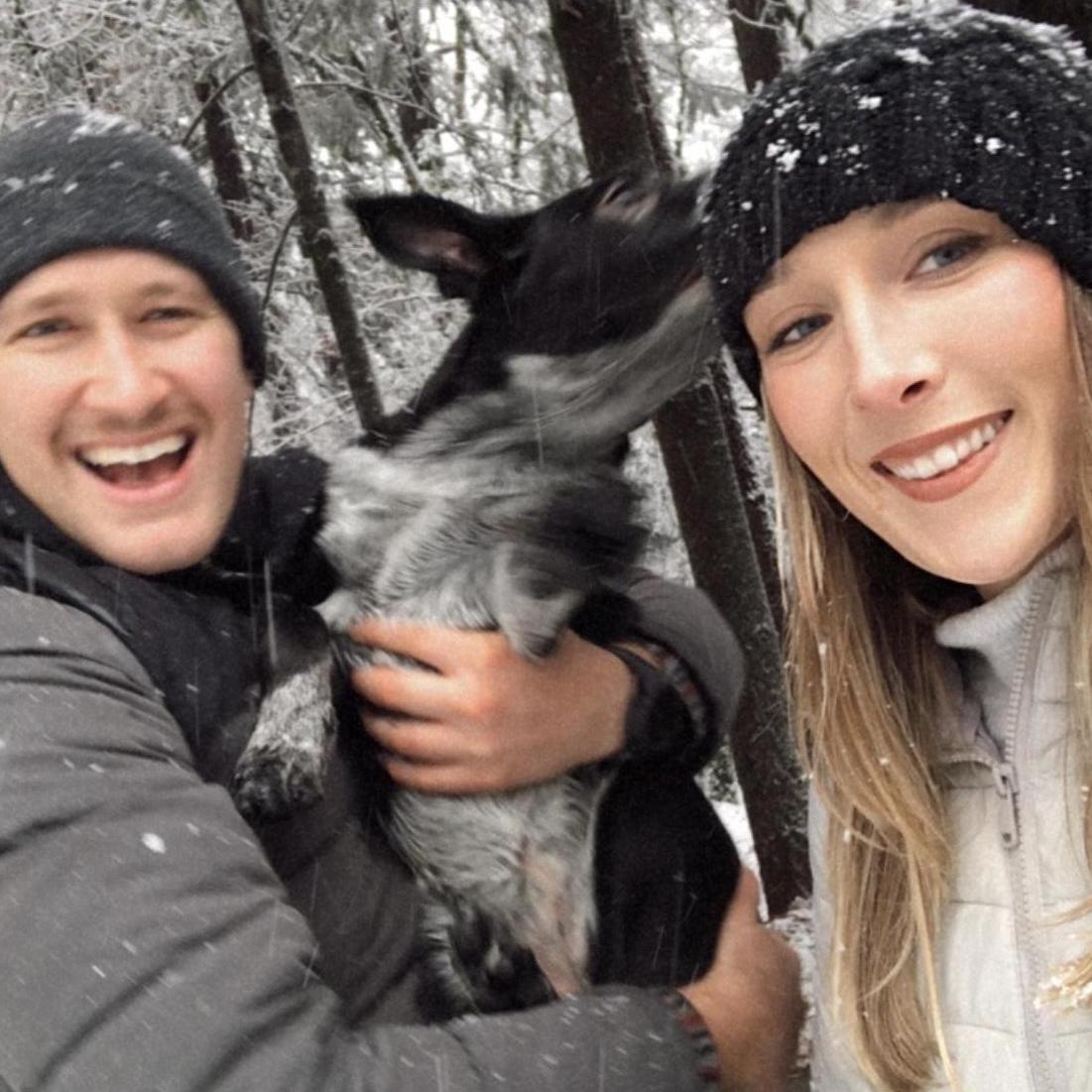 Us with our dog Dixie playing in the snow