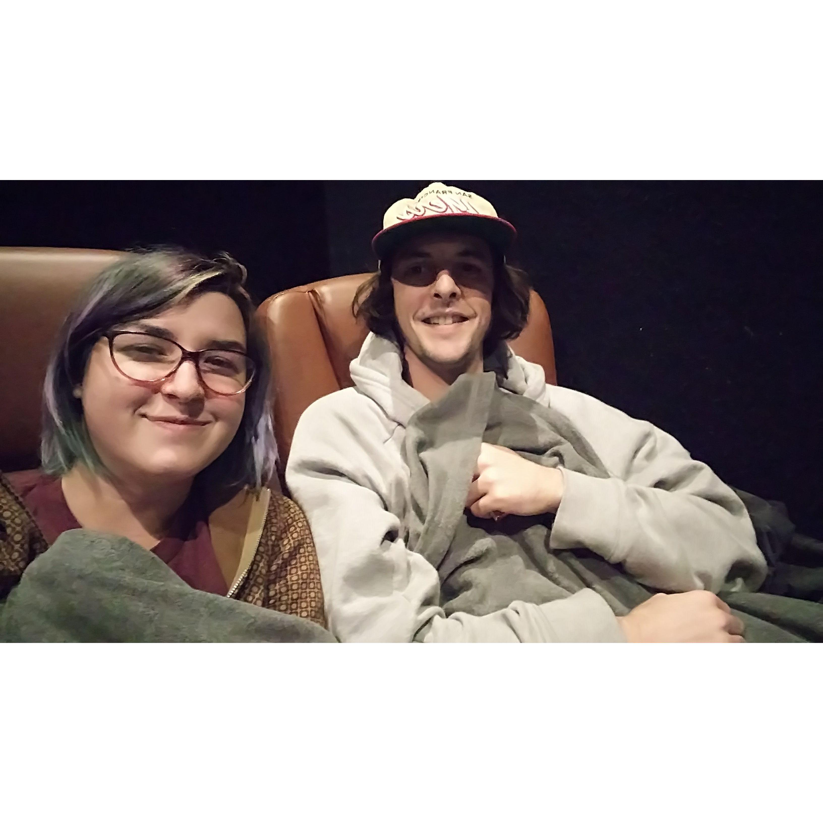 Date night to the movies complete with a cozy blanket and empty theater.