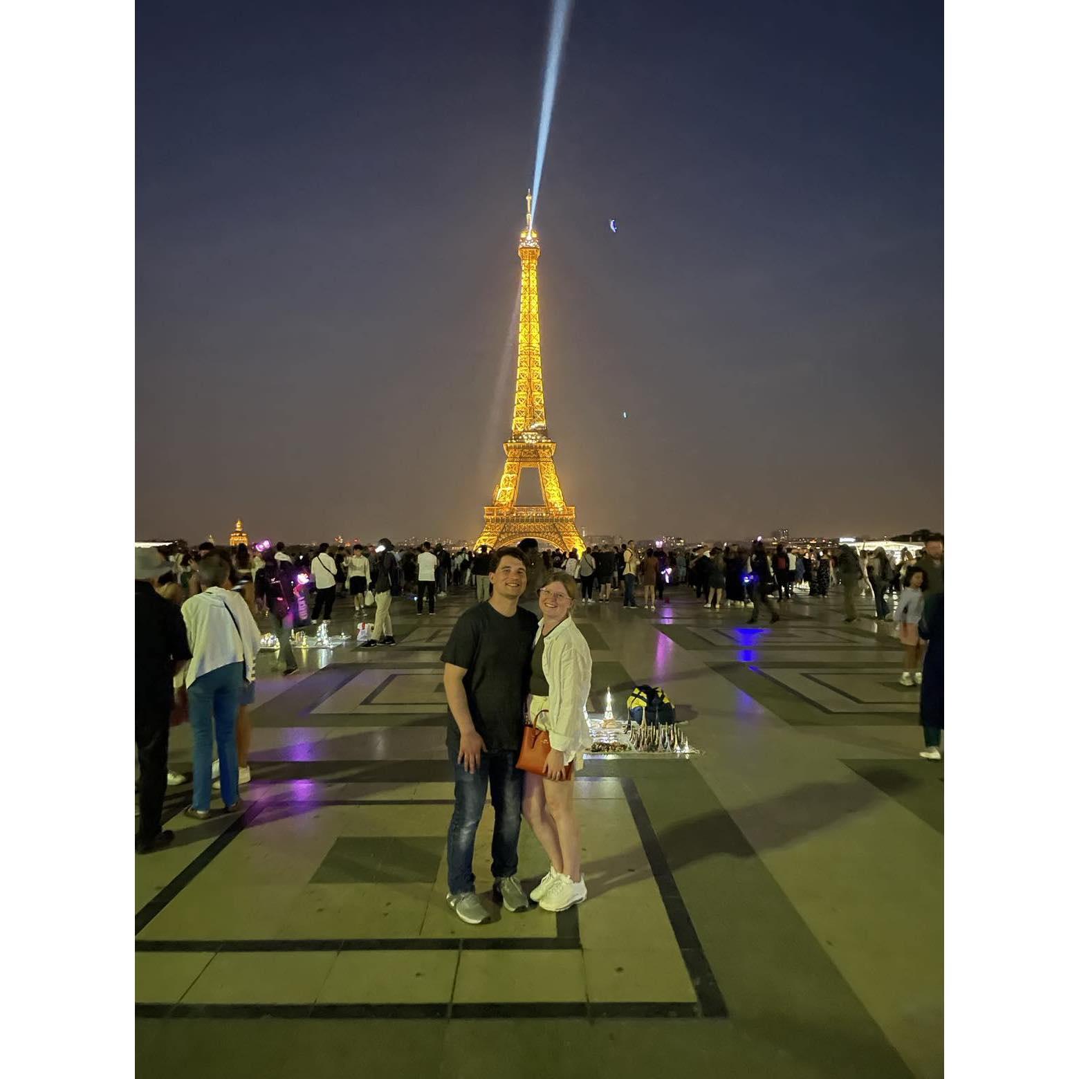 Seeing the Eiffel Tower twinkle at night.