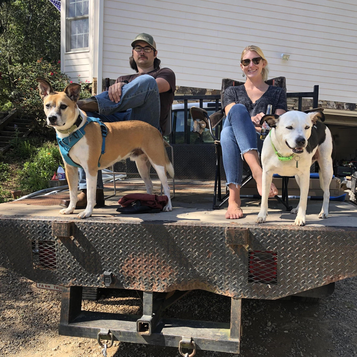 Doing one of our favorite things... Enjoying some sunshine, watching cows, and hanging out with the dogs and family.