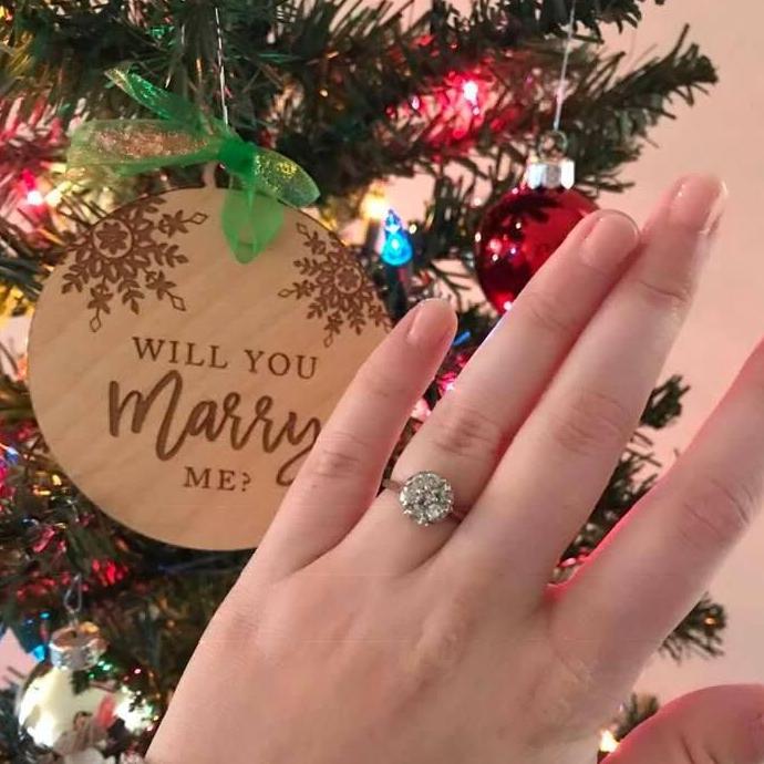 Niles proposed to Megan on November 24, 2018. He asked her to help him put up his Christmas tree and when she opened up an ornament that said "Will you marry me?" Niles was on one knee with the ring!