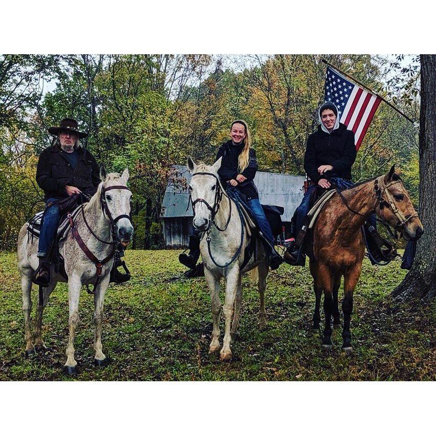 A picture of the time we booked a horseback camping trip, so our tour guide Cowboy Joe left us at the top of a WV mountain with 3 loose horses and a gun and said "see you in the morning".