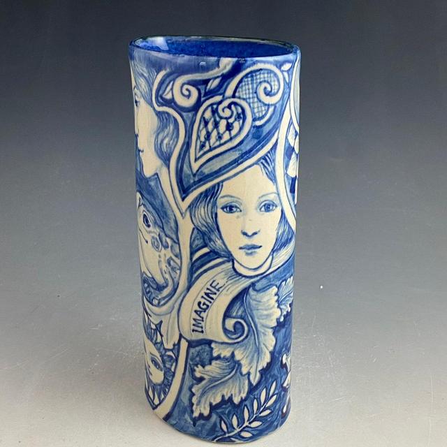 Blue and white 8.75 inch tall flower vase...