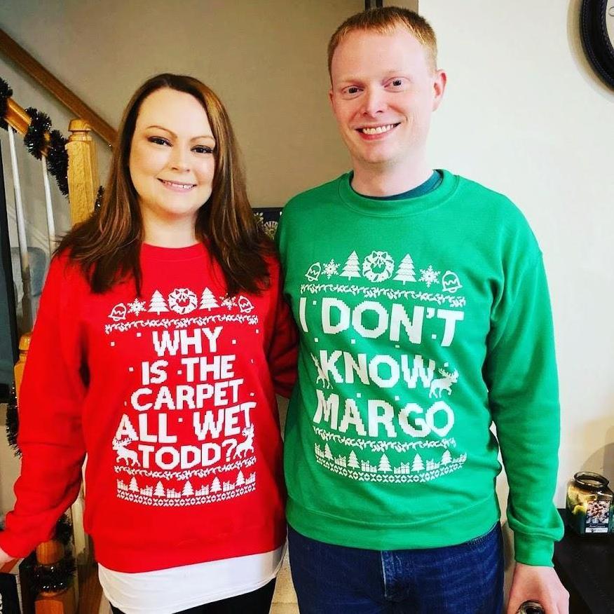 Who needs a "tacky" sweater at a Christmas party when you can wear something that asks, and answers,  one of life's most thought about questions.