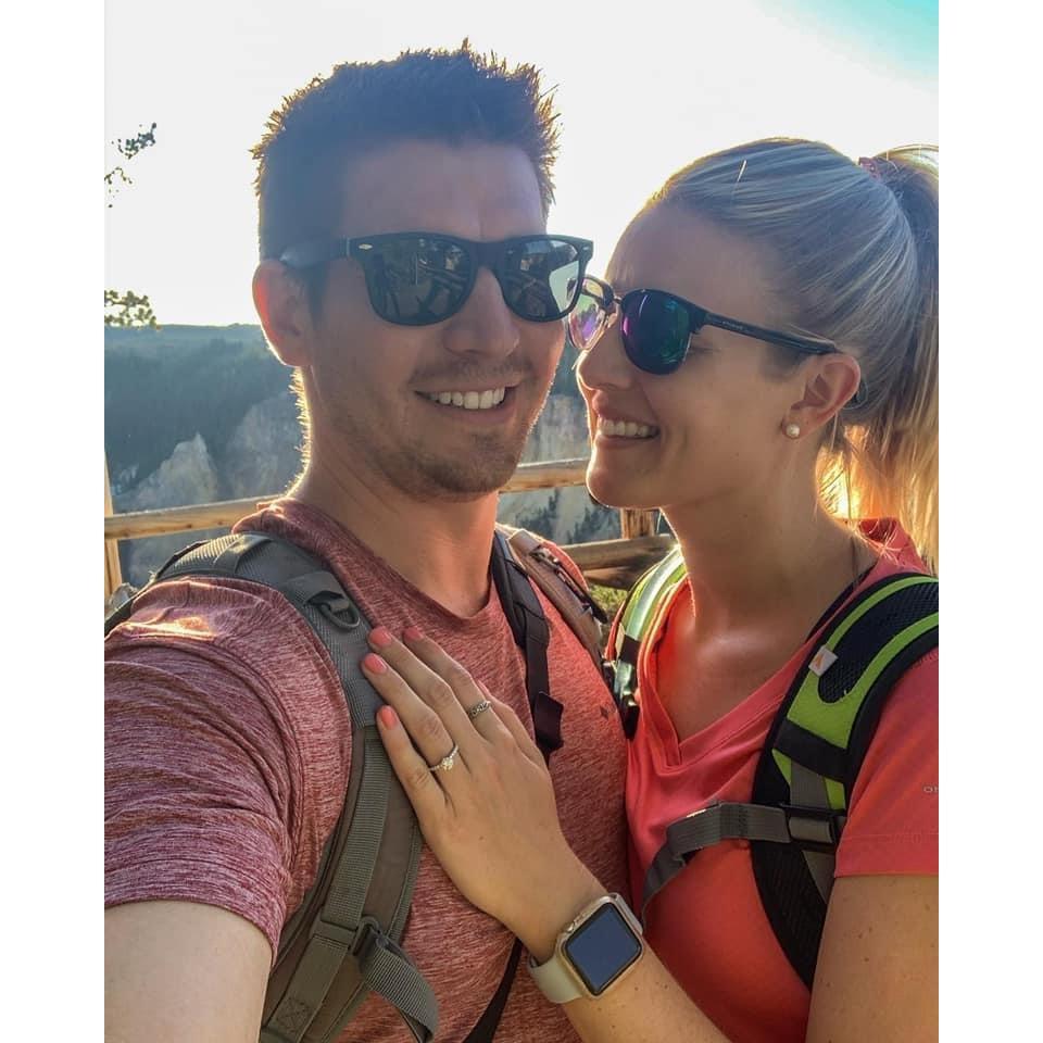 We're engaged! Taken moments after Adam proposed, along the Grand Canyon of Yellowstone's waterfall rim.