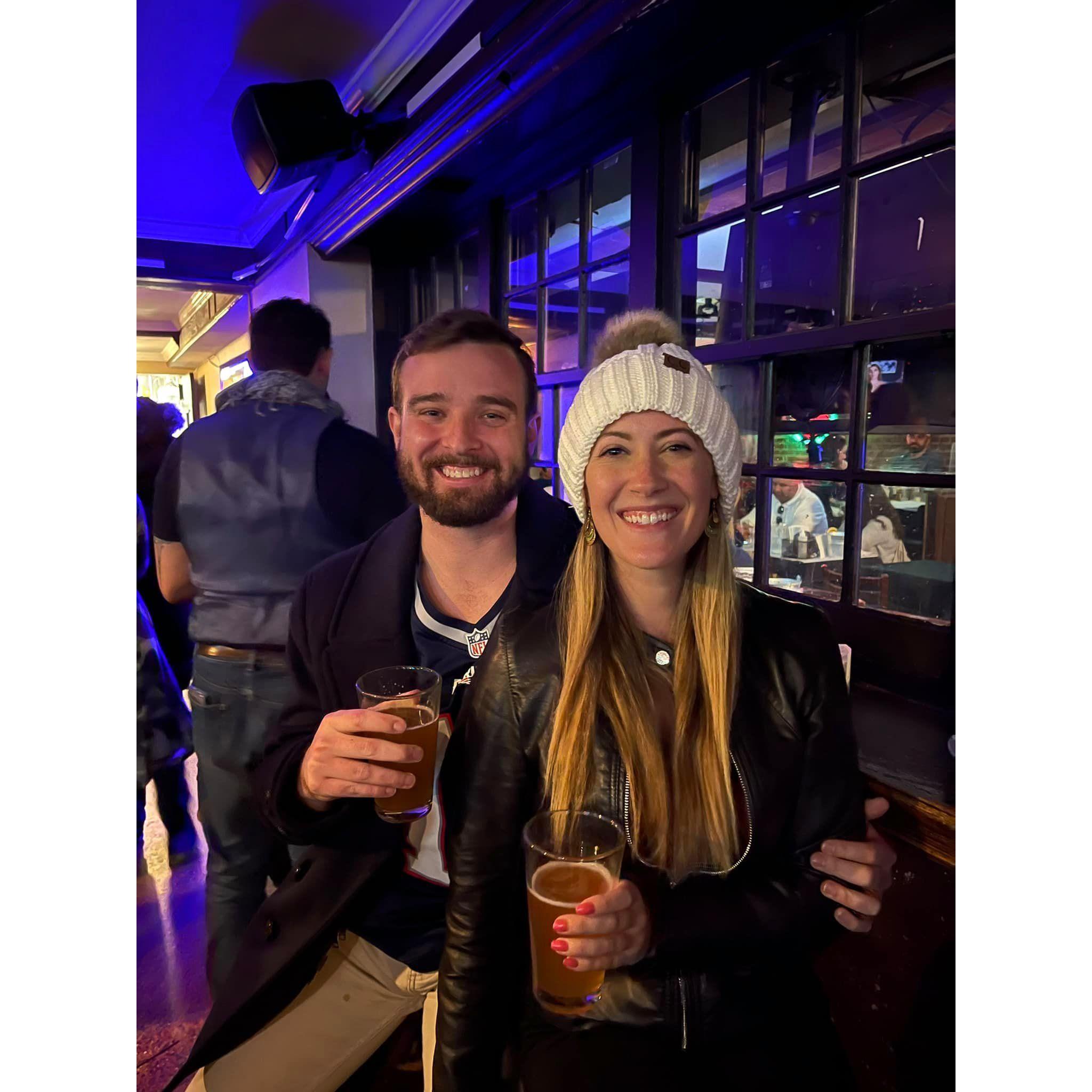 Even in the middle of Manhattan, these two will find a way to watch the game. Go Pats!